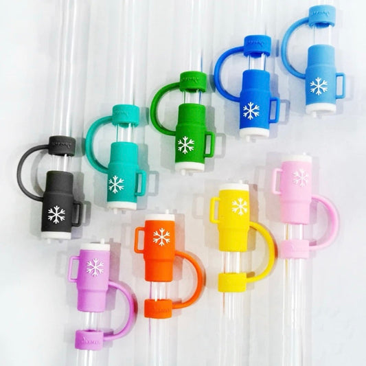 Colorful straw tips with snowflake design on a white background