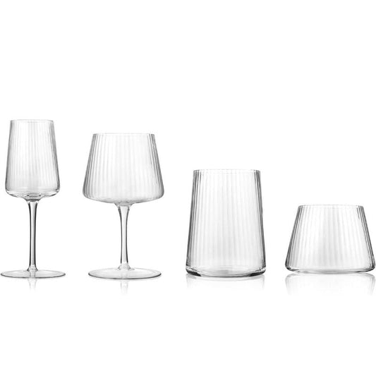 Set of four clear glassware pieces on a white background